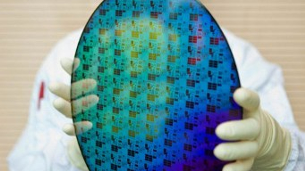 <div style="text-align: left;">
The ASM International group makes equipment for the production of semiconductors, such as this 300mm wafer (AFP) </div>