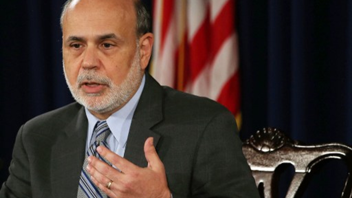 US Federal Reserve chairman Ben Bernanke hinted that the Fed would reduce its vast purchases of US Treasuries, signalling an end to an era of ultra-low interest rates.