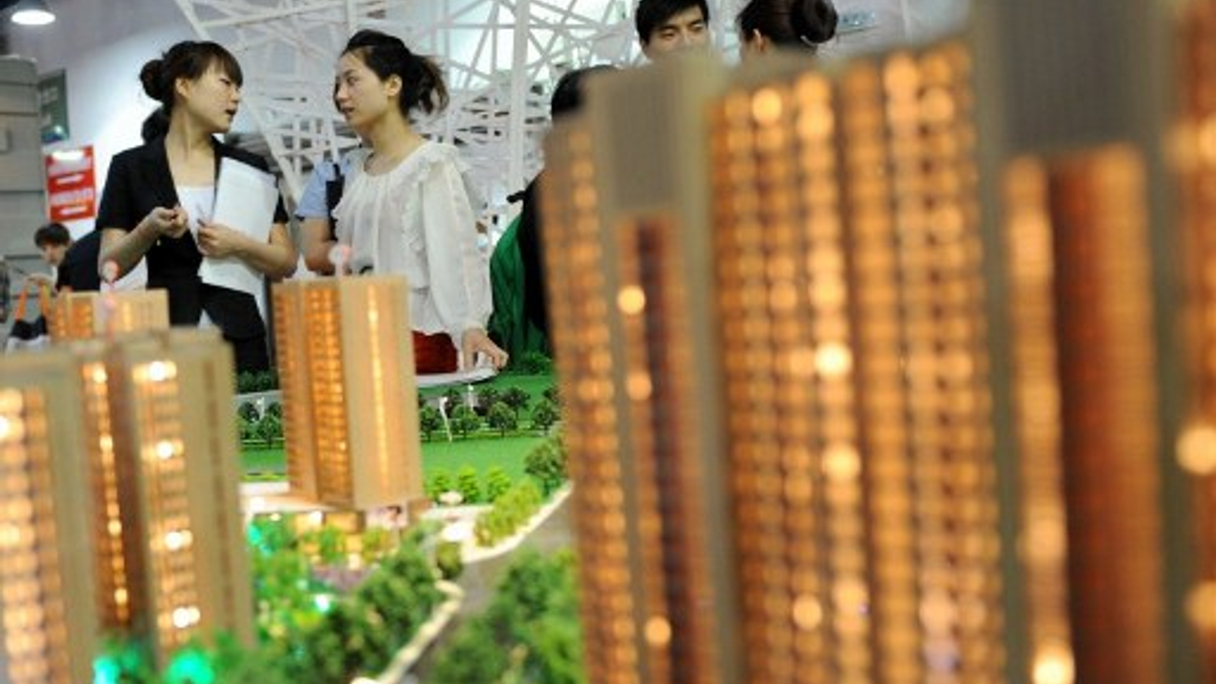 <div style="text-align: left;">
Potential buyers check out a property fair in the Chinese city of Hangzhou (AFP)</div>