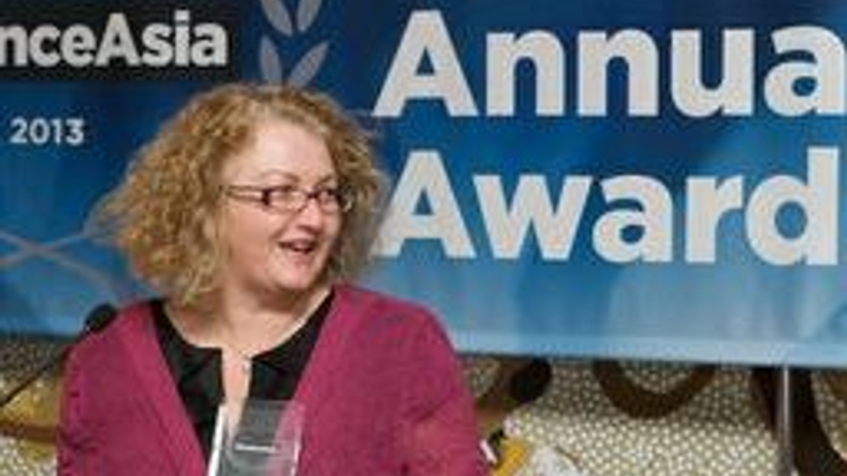 Christina Tonkin from ANZ accepts the first award of the night, Best Local Commercial Bank