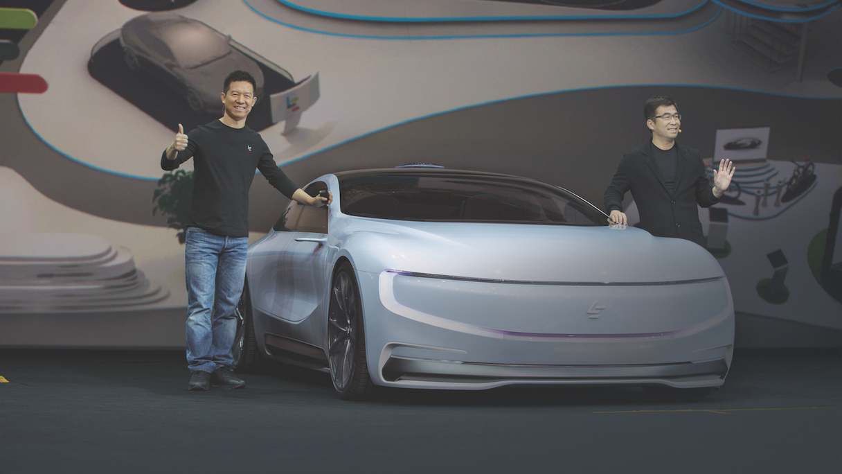 LeEco chairman Jia Yueting (left) and Ding Lei, head of its auto division, unveil the company's new electric car concept.