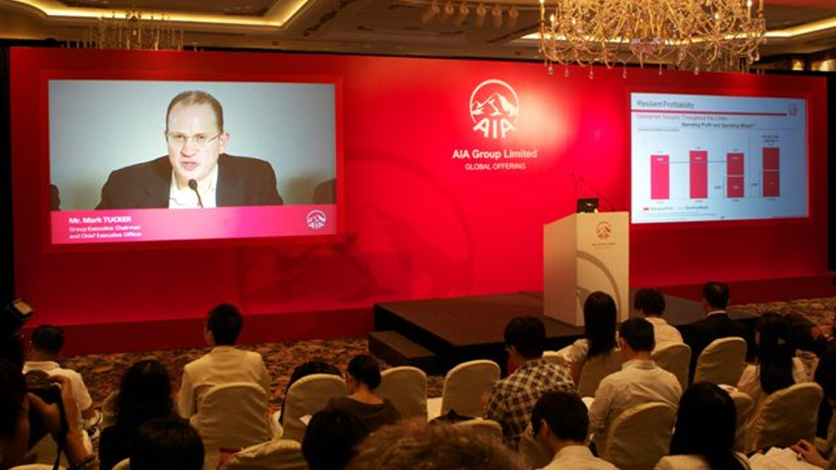 Mark Tucker addresses the Hong Kong media via video link