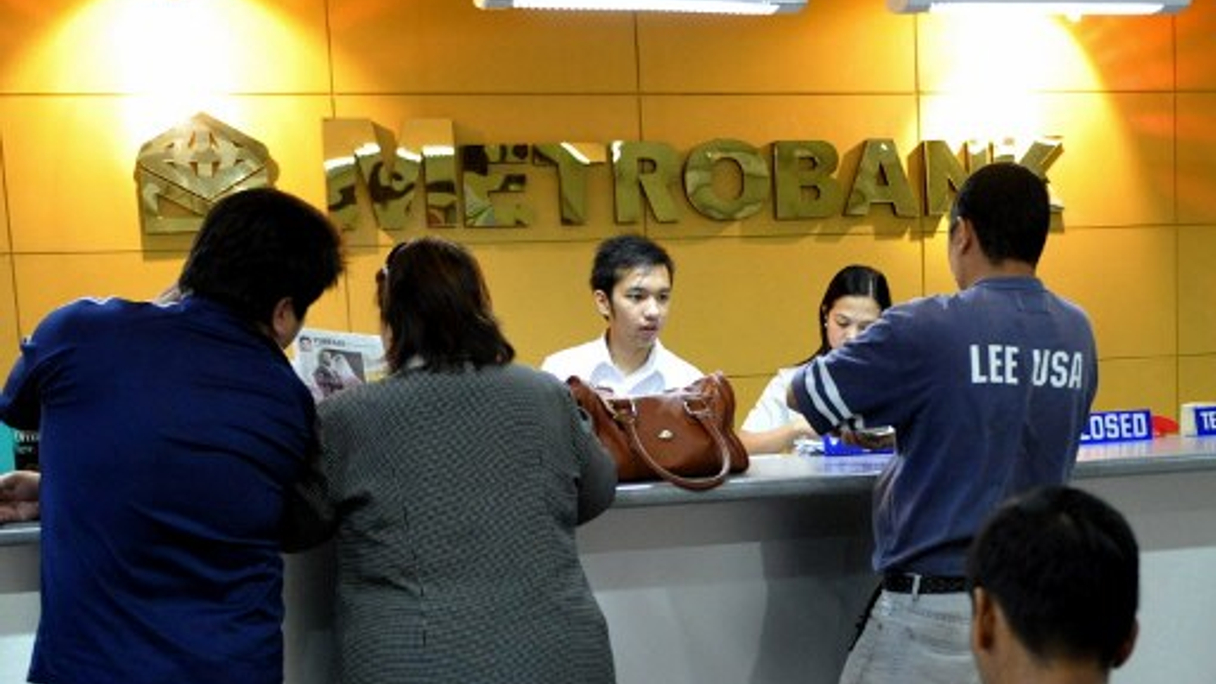 <div style="text-align: left;">
Metropolitan Bank and Trust (Metrobank) is part of soon-to-be-listed conglomerate GT Capital (AFP)</div>