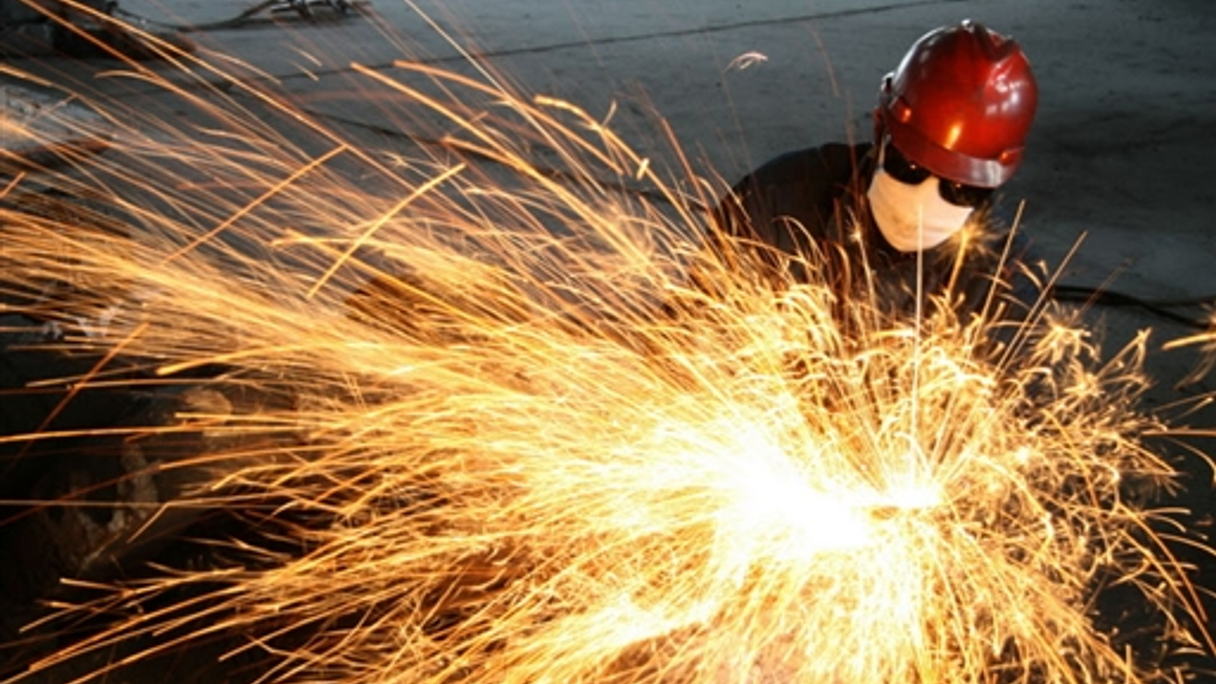 A worker at an aluminium factory in Xining does his part in driving China's economic growth