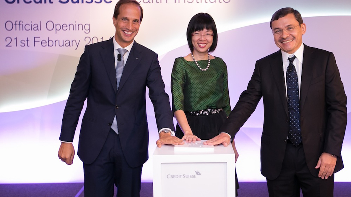 Credit Suisse's Francesco de Ferrari and Helman Sitohang with Ong Puay See, CEO of Singapore's Institute of Banking and Finance