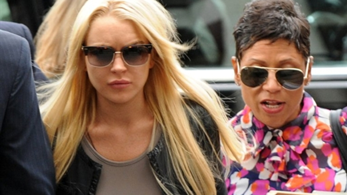 Lidsay Lohan with her lawyer Shawn Chapman Holly