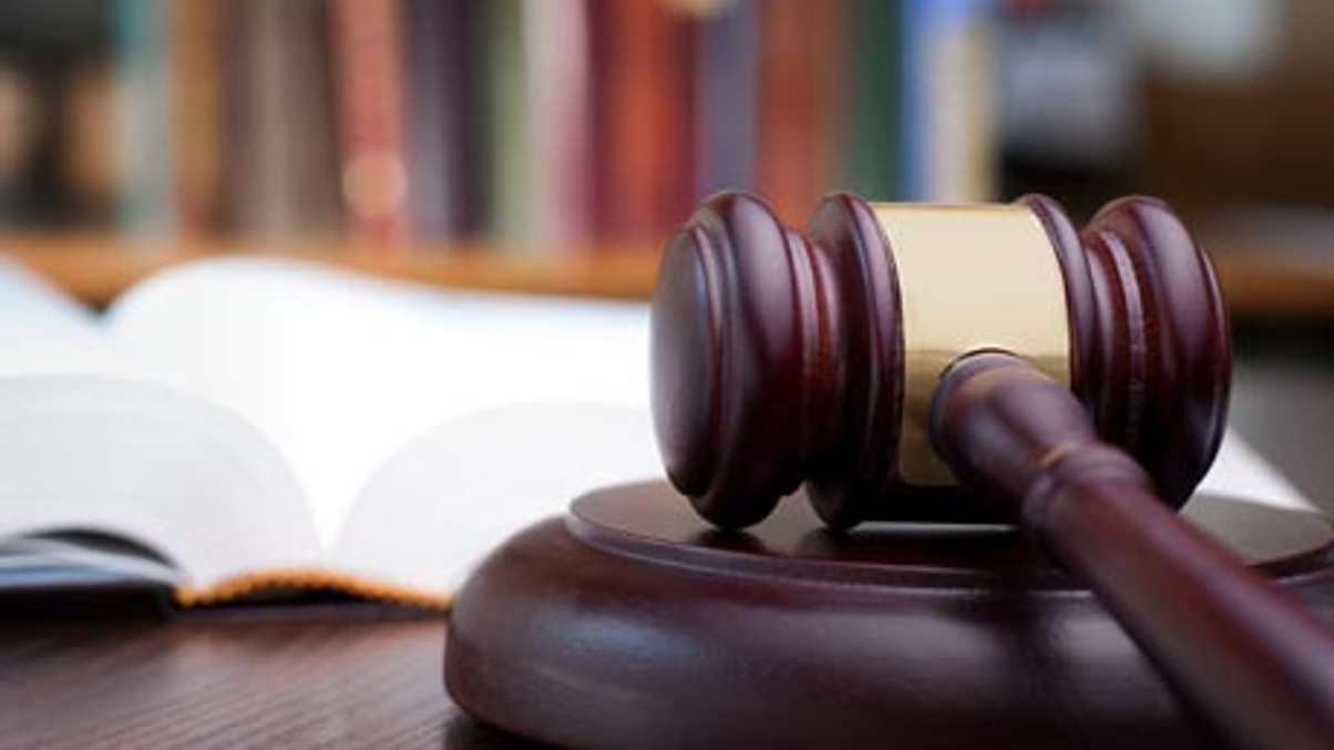 HK SFC bans one exec, suspends another