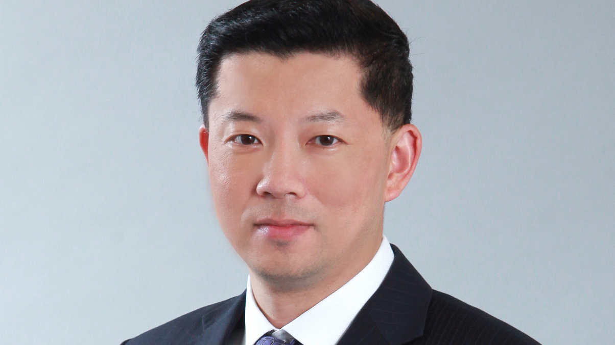 Haitong boss proposes MPF fee split amid uncertainty