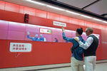 Ads vie with phones for ...