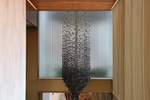 A chandelier-like charcoal ...