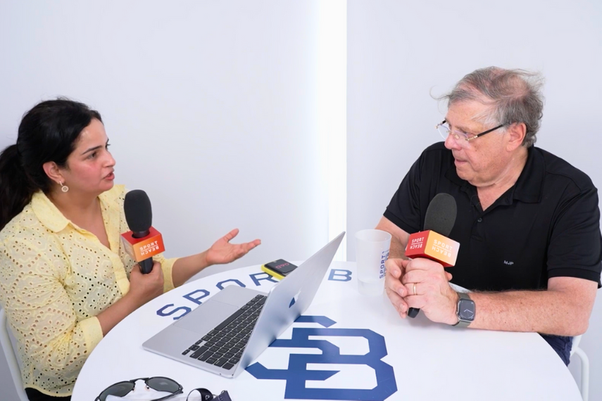 Mark Penn (r) with Campaign's Nikita Mishra (l) at Sport Beach, Cannes