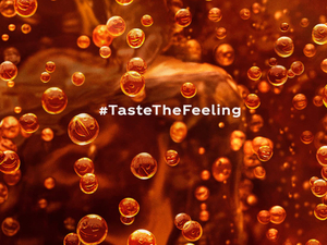 Have a Coke, and a million tiny emoji smiles