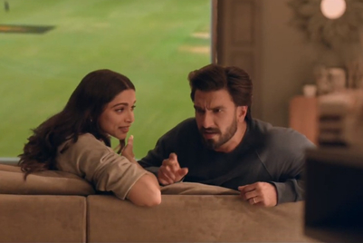 Cricket commentary from Deepika Padukone as Ranveer Singh looks away from the game