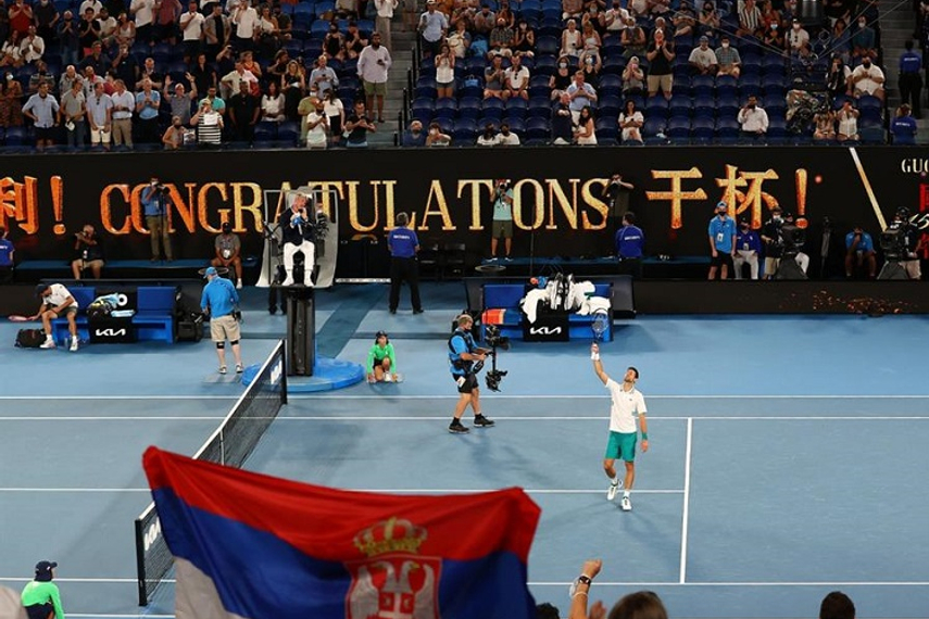 Crowds cheer Novak Djokovic after victory at the semi-final of the Australian Open on 18 February (Getty Images)