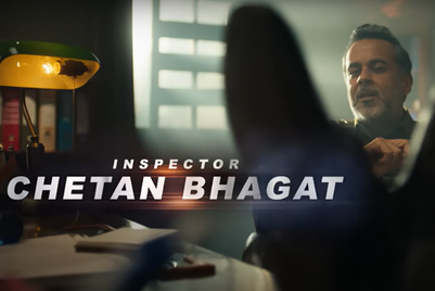 Chetan Bhagat dons the cop uniform for Henry Harvin