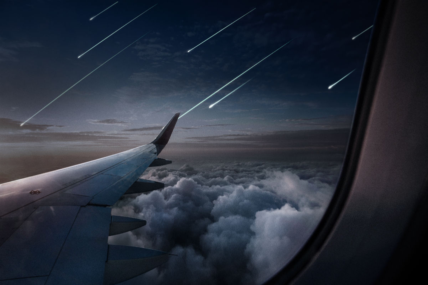 飛行機から見た人工流れ星のイメージ。
