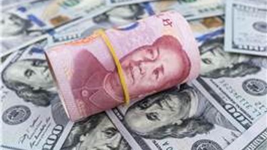 Companies abandon dollar reporting for RMB Companies abandon dollar reporting for RMB