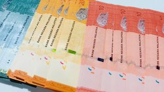 Malaysia girds for trade war by easing currency conversion rules Malaysia girds for trade war by easing currency conversion rules