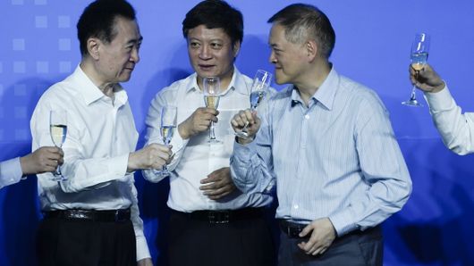 The three chairmen enjoy a post-deal drink ... but it's the CFOs who really need one The three chairmen enjoy a post-deal drink ... but it's the CFOs who really need one