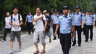 Police quell attempts at a protest in Beijing over the collapse of P2P lenders. Police quell attempts at a protest in Beijing over the collapse of P2P lenders.